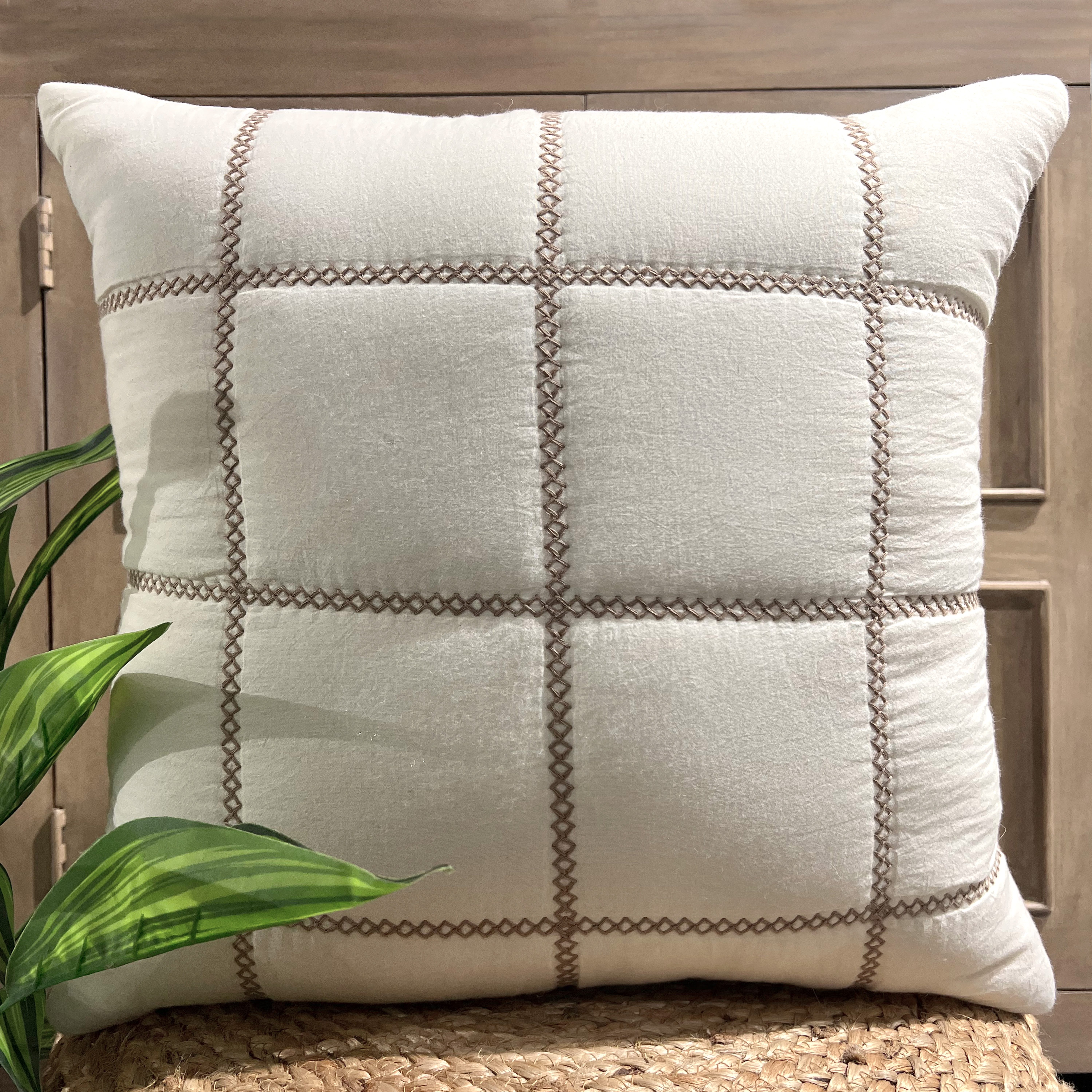 Windowpane chain stitch embroidered cushion in soft mint blue