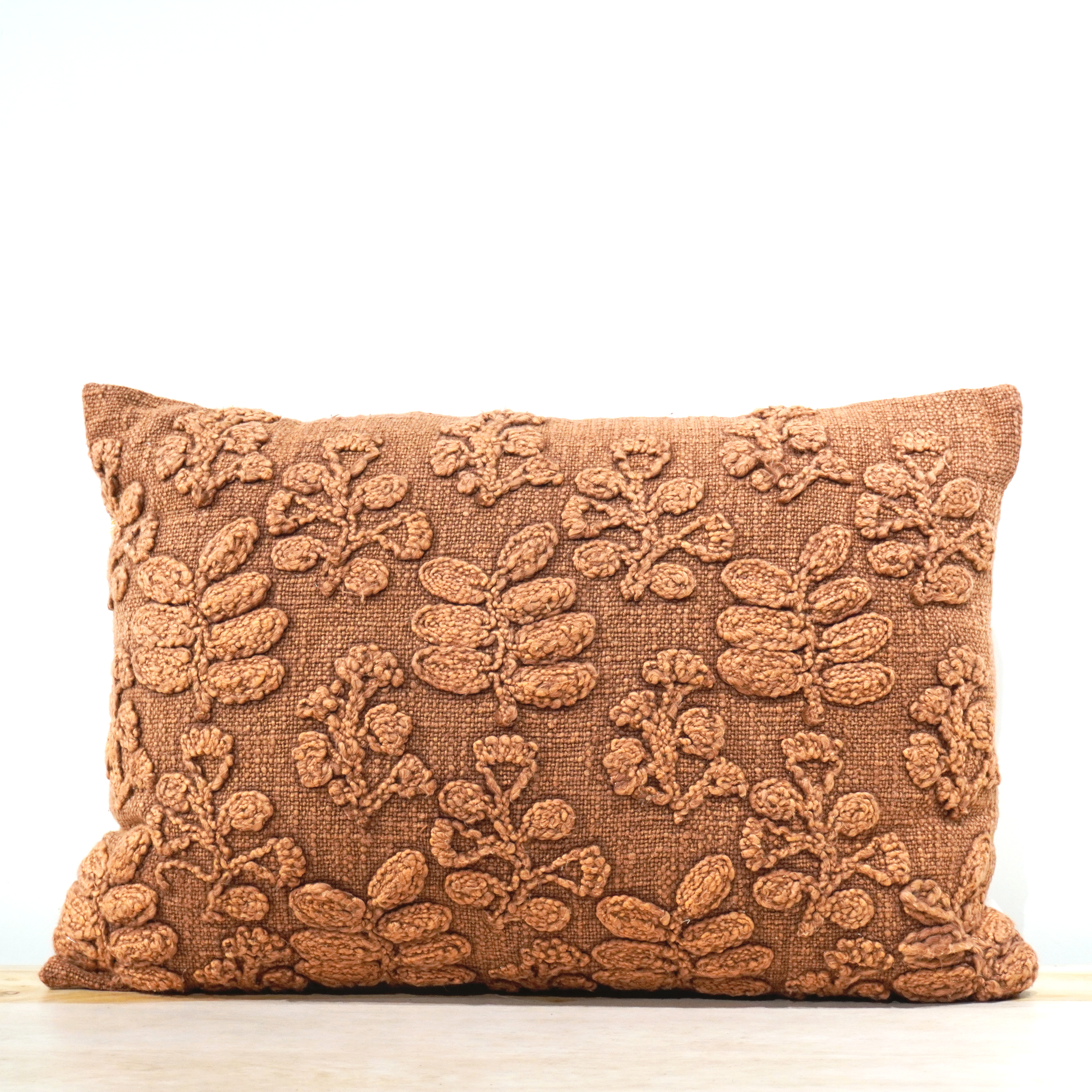 Rust terracotta botanical cord stitch embroidered lumbar cushion