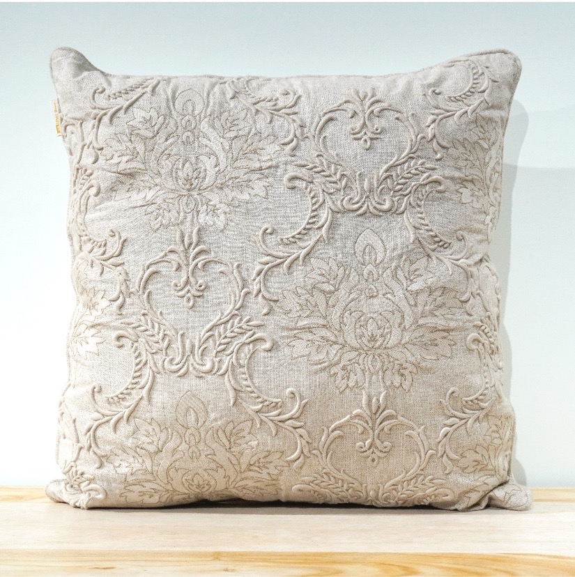 Damask scrollwork embroidered cushion in natural linen