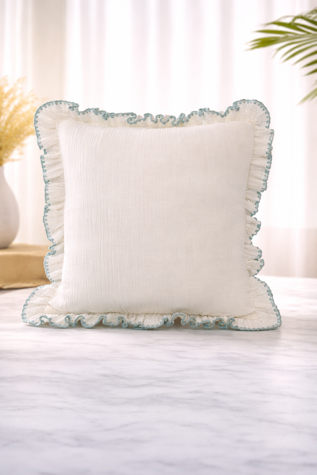 AH-10100-C White Muslin Cushion with Teal Ruffle Border