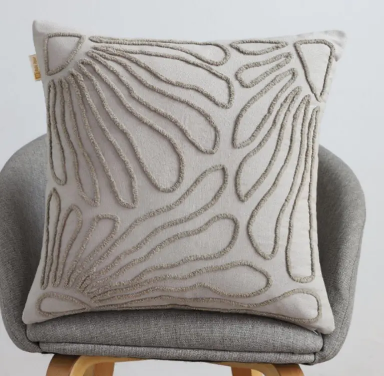 EMBROIDERED CUSHION