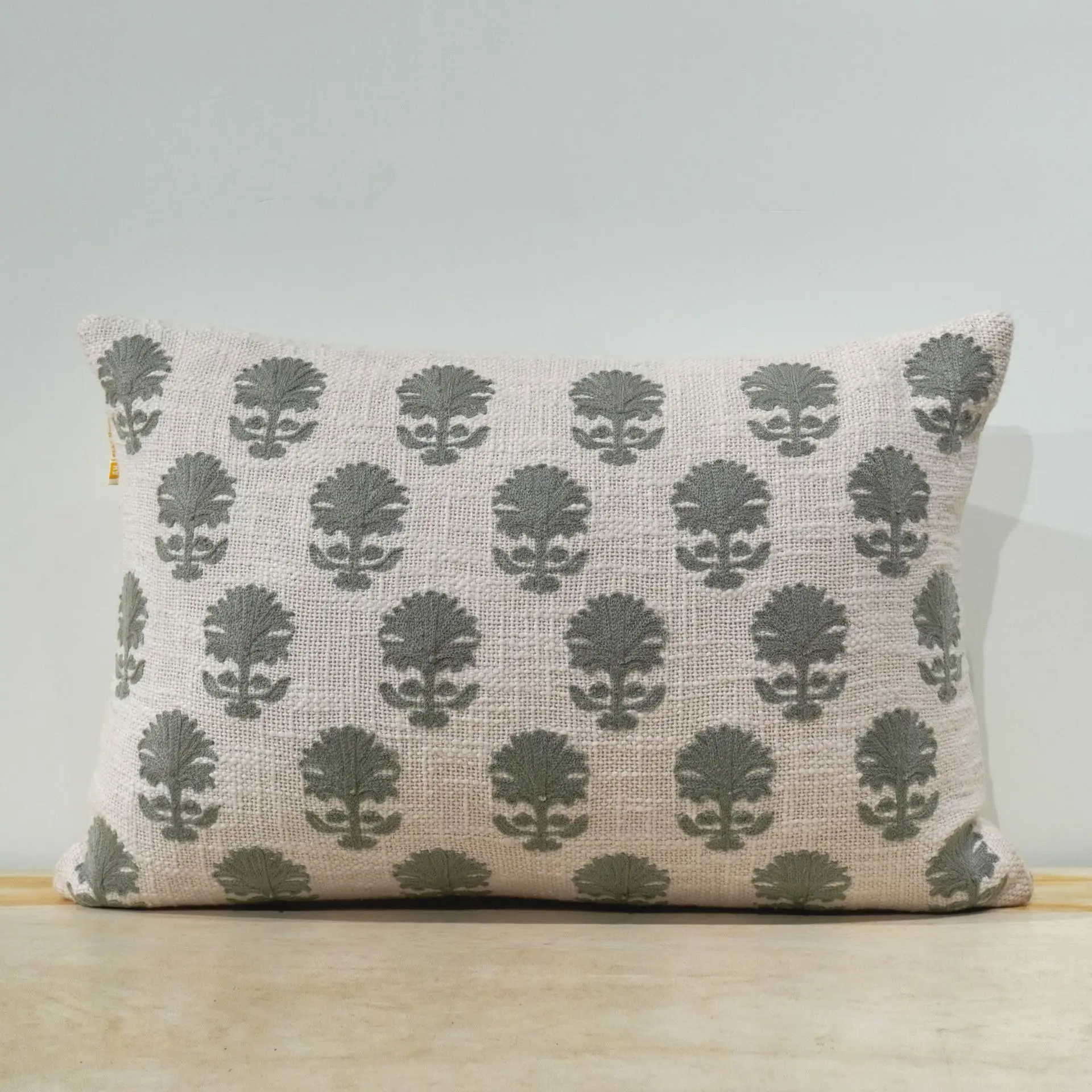 EMBROIDERED CUSHION